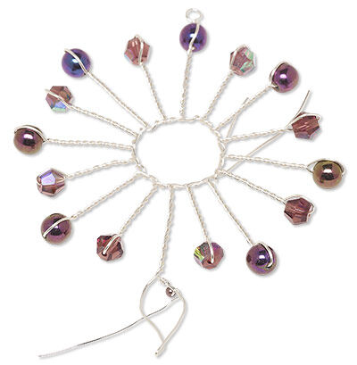 Looped twisted wire with beads